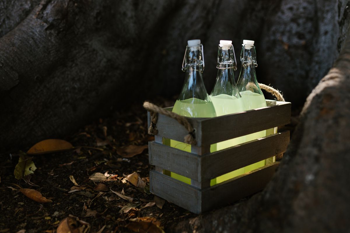Lemonade bottles lined in a wooden cart